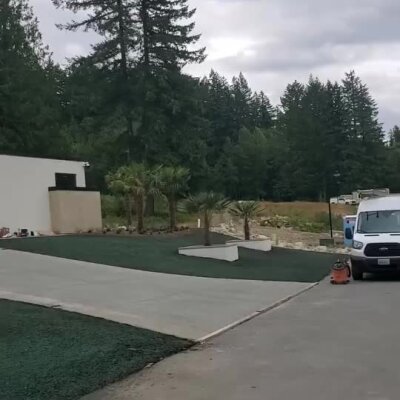 Front yard hydroseed installation at high-end new construction home in Redmond, Washington.
