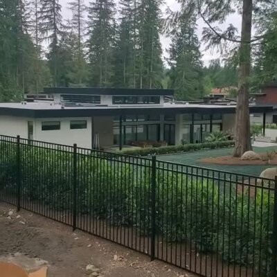 Modern home with newly installed lawn and landscaping in Redmond, Washington.